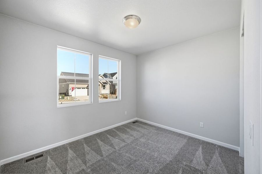 Spacious, unfurnished interior of a new home in Macanta, Castle Rock (Image 22).