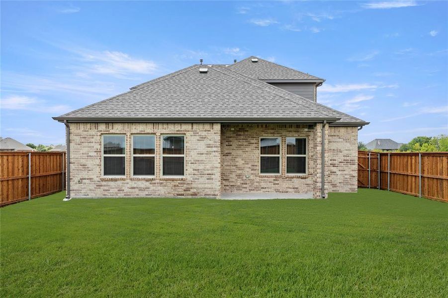 Front exterior of a new home in Las Lomas, Forney, TX, highlighting curb appeal (Image 19). Front exterior of a new home in Las Lomas, Forney, TX, highlighting curb appeal (Image 19).