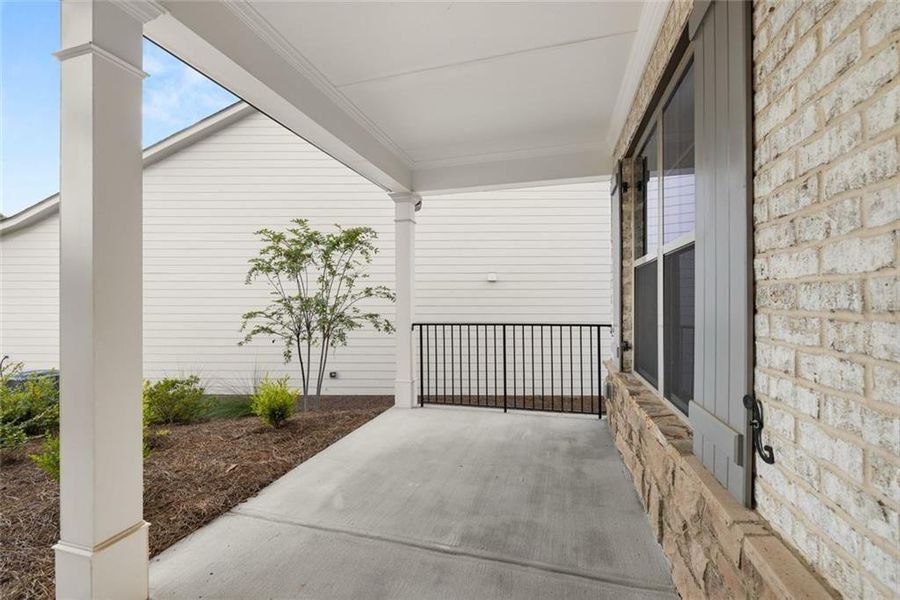 Exterior details and patio area of a home in Soleil Summit Chase, Snellville (Image 3).