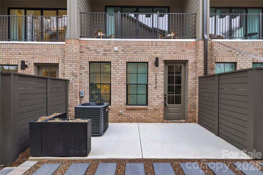 Exterior details and patio area of a home in , Charlotte (Image 25).
