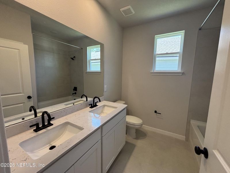 Furnished interior view inside a new home in Reserve East, Flagler Beach (Image 35).