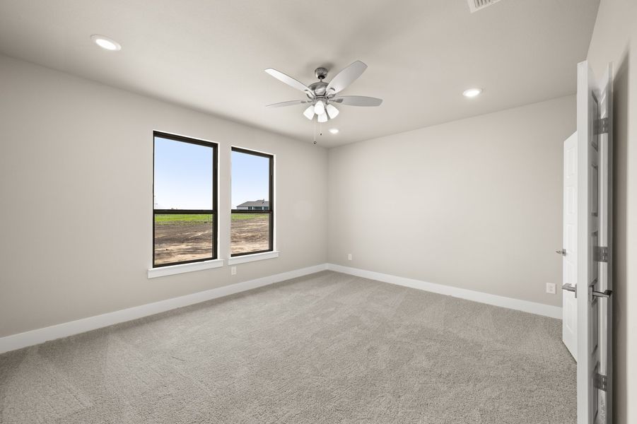 Front exterior of a new home in Carrera Ranch, Waxahachie, TX, highlighting curb appeal (Image 12).