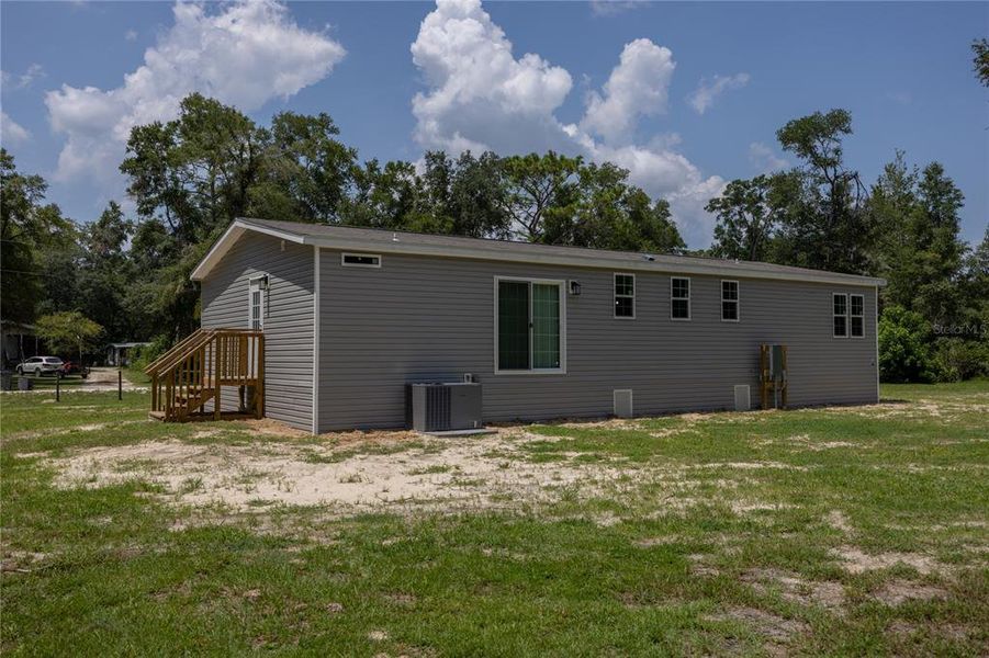 Front exterior of a new home in , Fort White, FL, highlighting curb appeal (Image 2).