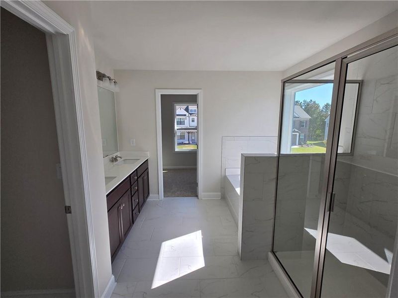 Furnished interior view inside a new home in Enclave at Logan Point, Loganville (Image 9).