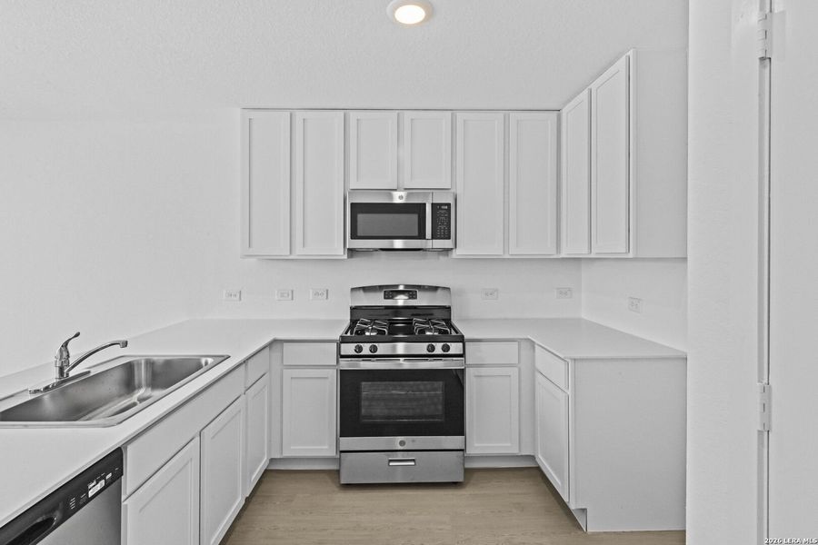 Furnished interior view inside a new home in Spring Grove, St. Hedwig (Image 6).