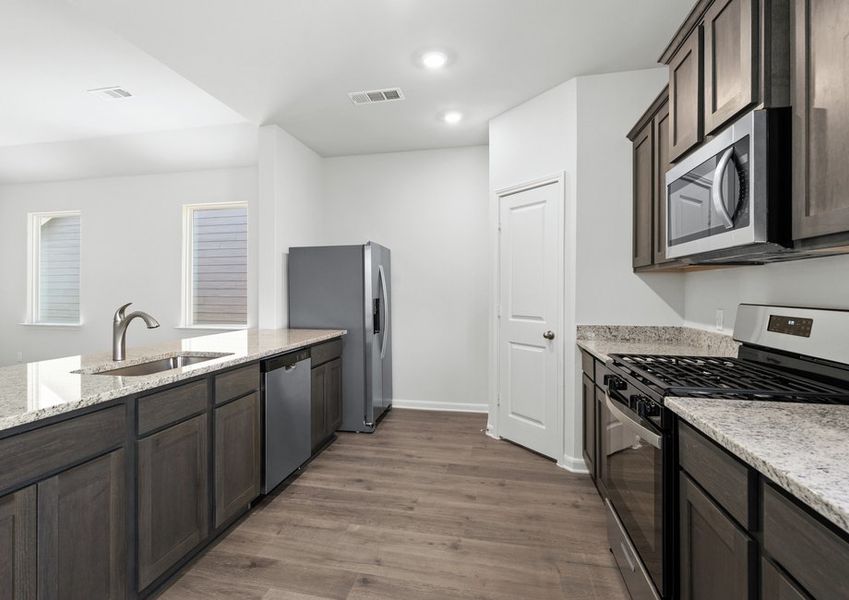 The kitchen of the Reed has energy-efficient appliances. The kitchen of the Reed has energy-efficient appliances.