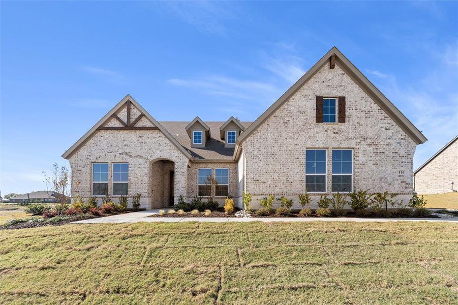 Front exterior of a new home in Creekview Addition, Van Alstyne, TX, highlighting curb appeal (Image 24).