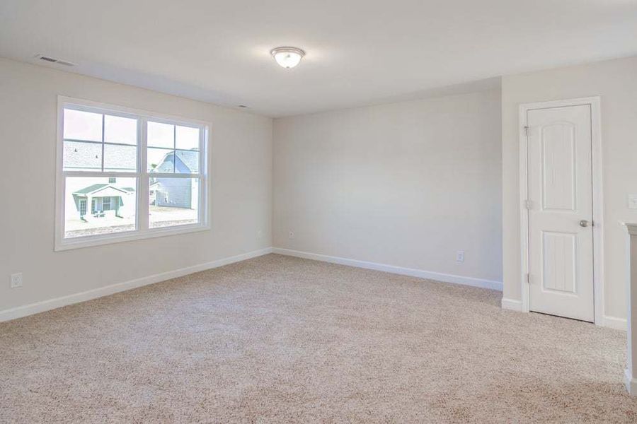 Representative unfurnished interior of a home built from the Drayton by Caviness & Cates Communities in Bartlett Manor, Youngsville (Image 85).