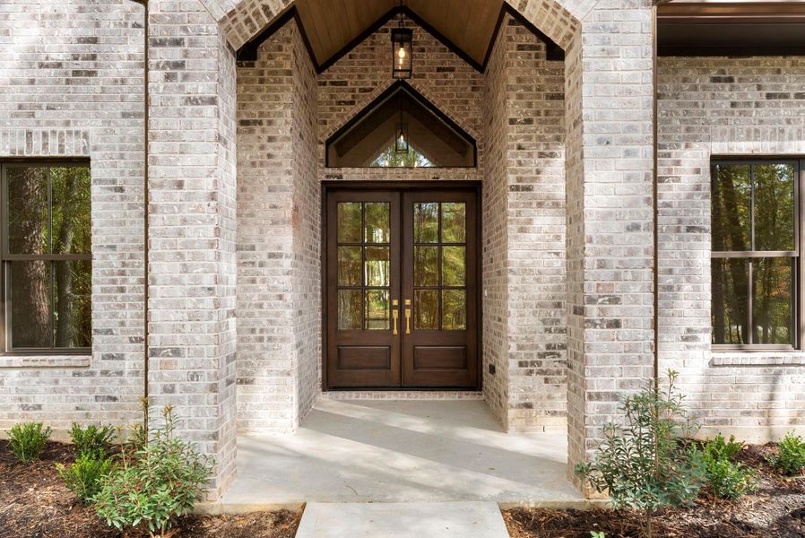 Exterior details and patio area of a home in , New Waverly (Image 3). Exterior details and patio area of a home in , New Waverly (Image 3).