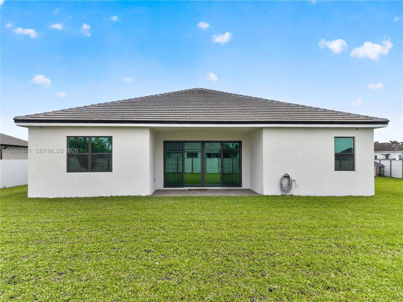 Exterior details and patio area of a home in , Homestead (Image 4).