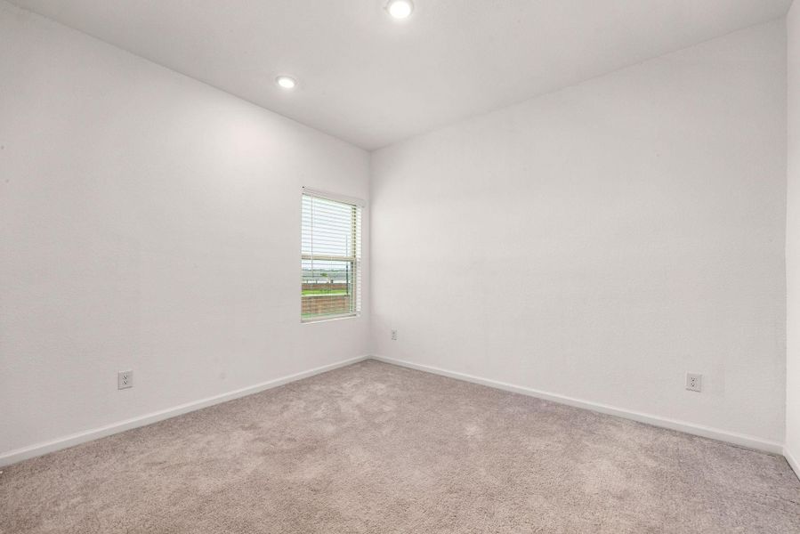 Spacious, unfurnished interior of a new home in Sunterra, Katy (Image 30).