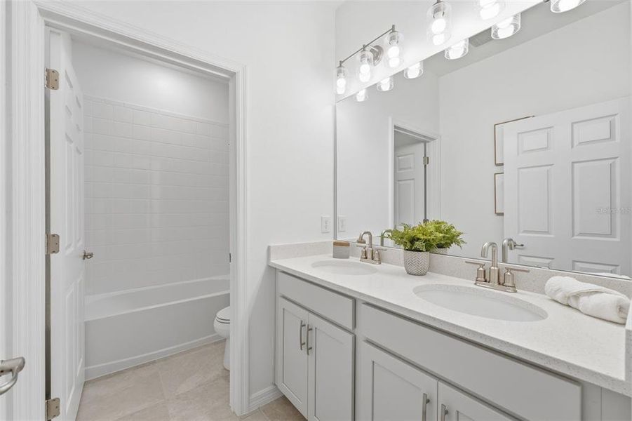 Furnished interior view inside a new home in Trinity Place, St. Cloud (Image 15).
