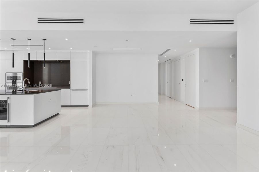Spacious, unfurnished interior of a new home in Aston Martin Residences, Miami (Image 35).