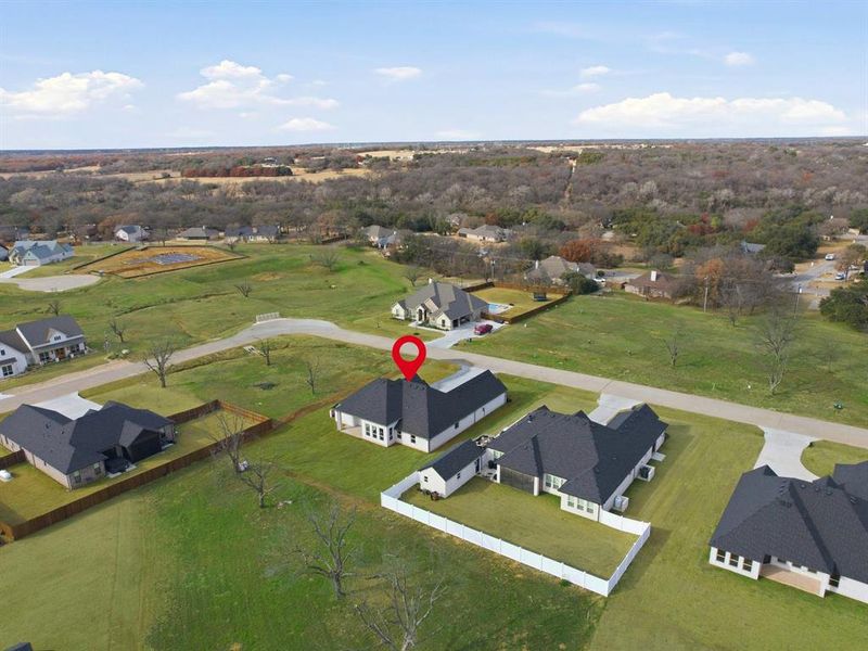 Exterior details and patio area of a home in , Granbury (Image 23).