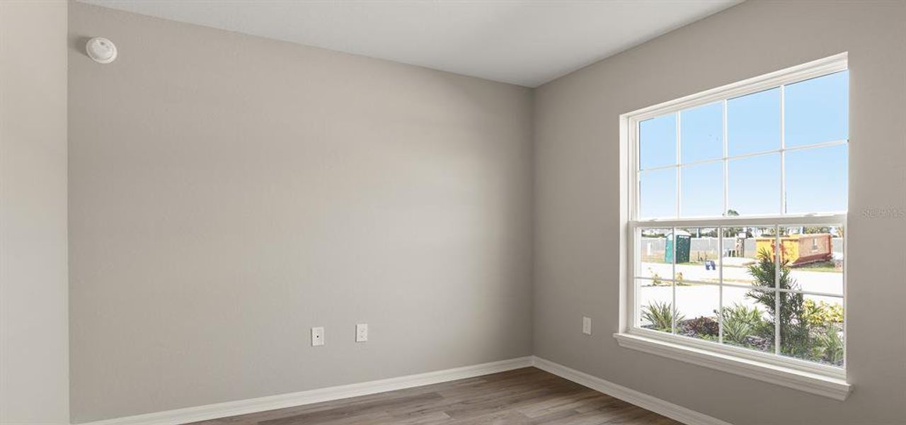 Spacious, unfurnished interior of a new home in Harbor at Lake Henry - Townhomes, Winter Haven (Image 17).