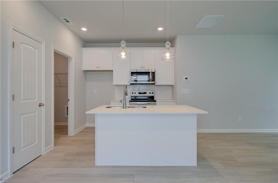 Furnished interior view inside a new home in Enclave at Evergreen, Fairburn (Image 3).