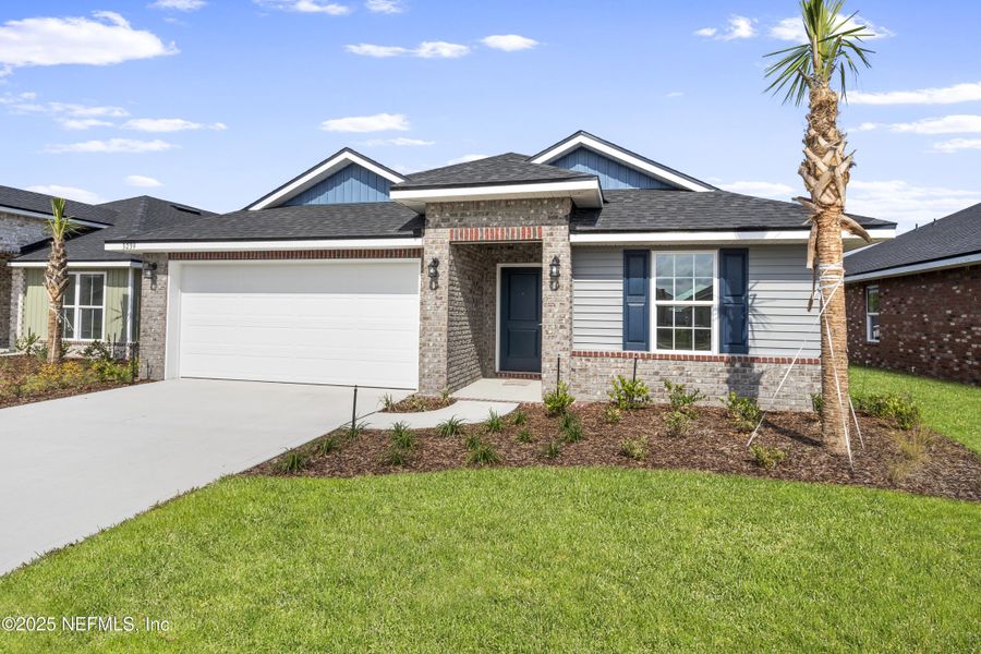 Front exterior of a new home in Shadow Crest at Rolling Hills, Green Cove Springs, FL, highlighting curb appeal (Image 15).