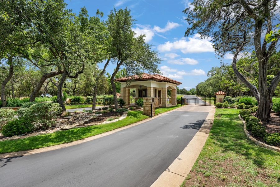 A grand entrance with a tile-roofed gatehouse welcomes residents to this private community. A grand entrance with a tile-roofed gatehouse welcomes residents to this private community.
