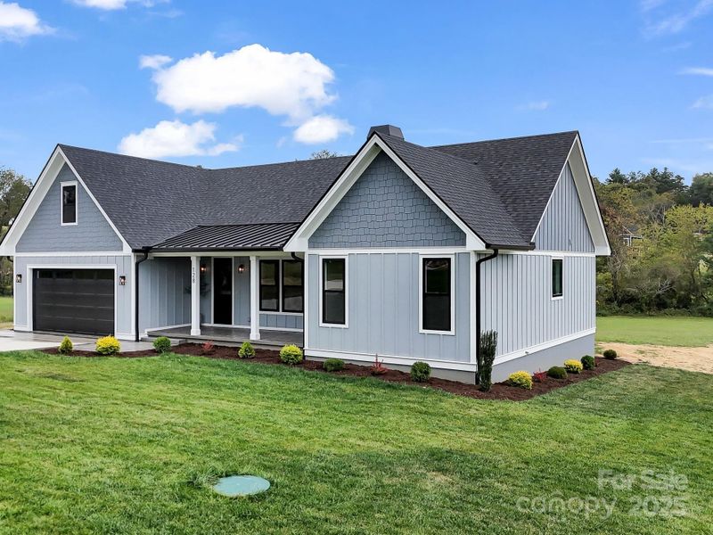 Front exterior of a new home in , Fletcher, NC, highlighting curb appeal (Image 1). Front exterior of a new home in , Fletcher, NC, highlighting curb appeal (Image 1).