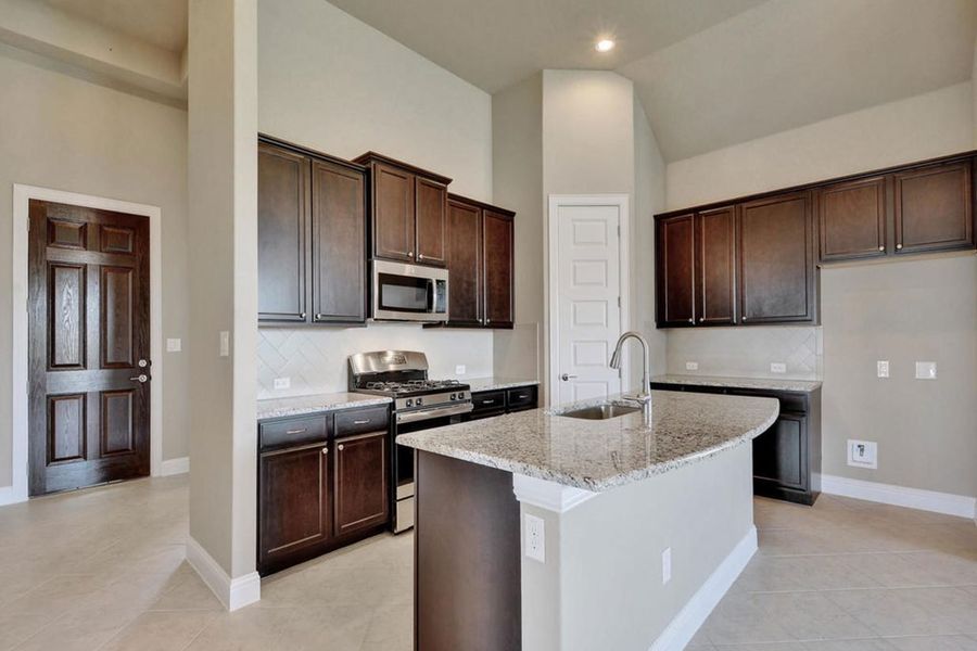 Representative furnished interior of a home built from the Oaks 1793 by Brohn Homes in Oaks at San Gabriel, Georgetown (Image 4).