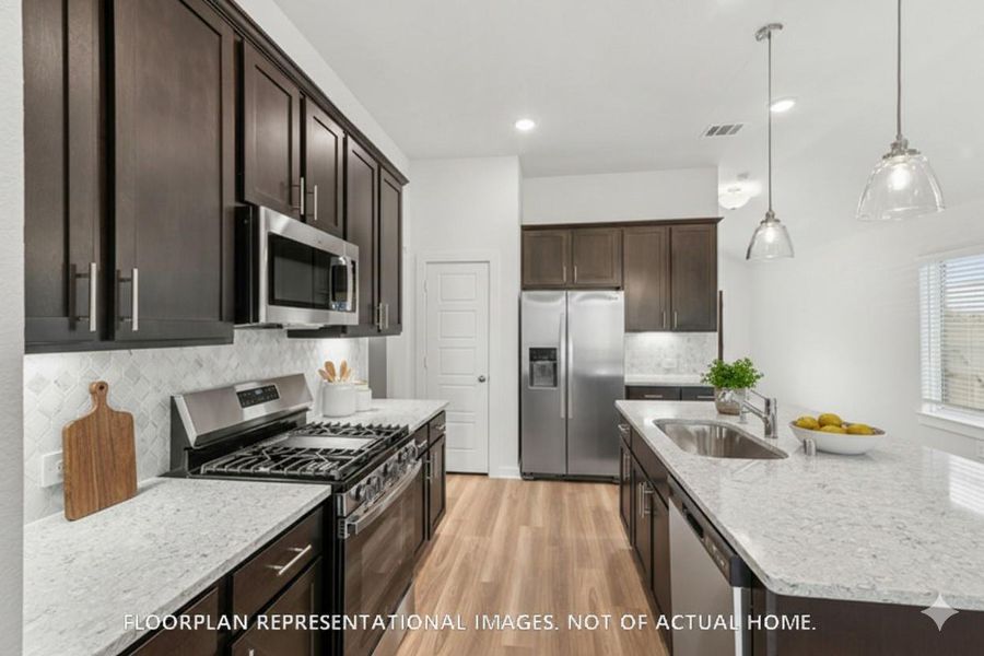 Furnished interior view inside a new home in Lone Star Landing, Montgomery (Image 5).