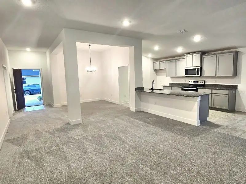 Spacious, unfurnished interior of a new home in Harmony Central, Harmony (Image 9).