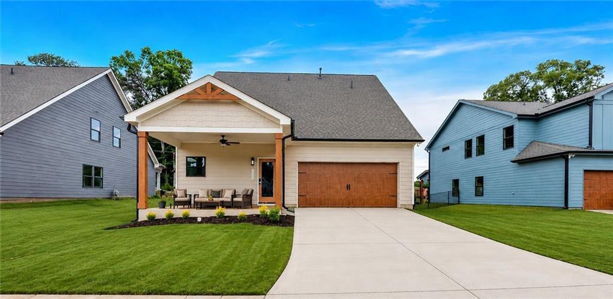 Front exterior of a new home in Ferguson Corners, Emerson, GA, highlighting curb appeal (Image 27). Front exterior of a new home in Ferguson Corners, Emerson, GA, highlighting curb appeal (Image 27).