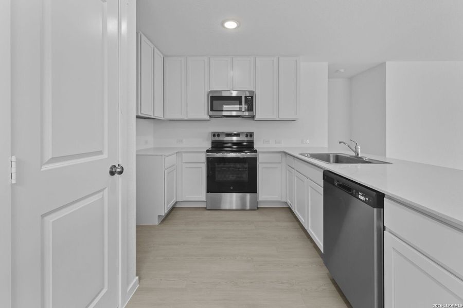 Furnished interior view inside a new home in Higdon Crossing, San Antonio (Image 6).