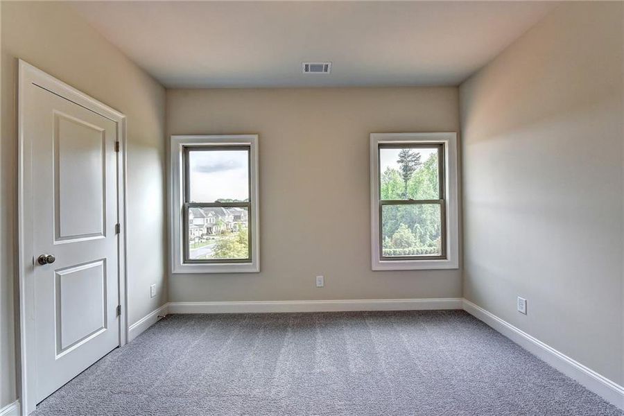 Spacious, unfurnished interior of a new home in Bellmoore Park, Duluth (Image 59).