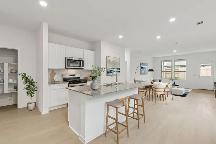 Furnished interior view inside a new home in Mavera, Conroe (Image 9).