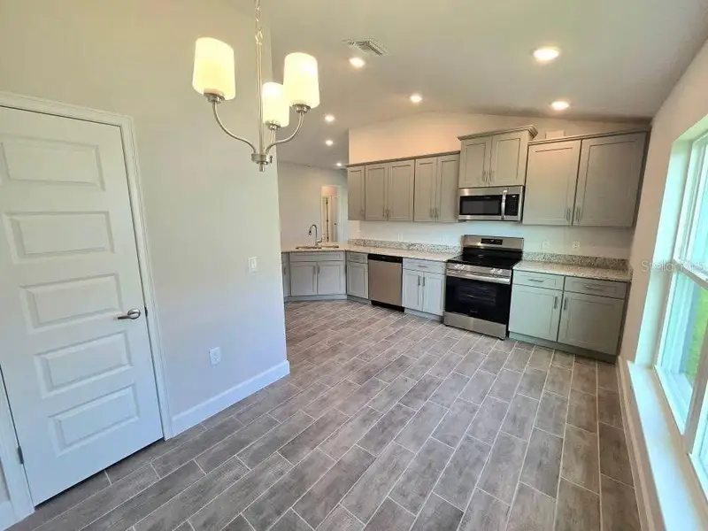 Furnished interior view inside a new home in Watercress Cove, North Port (Image 6). Furnished interior view inside a new home in Watercress Cove, North Port (Image 6).