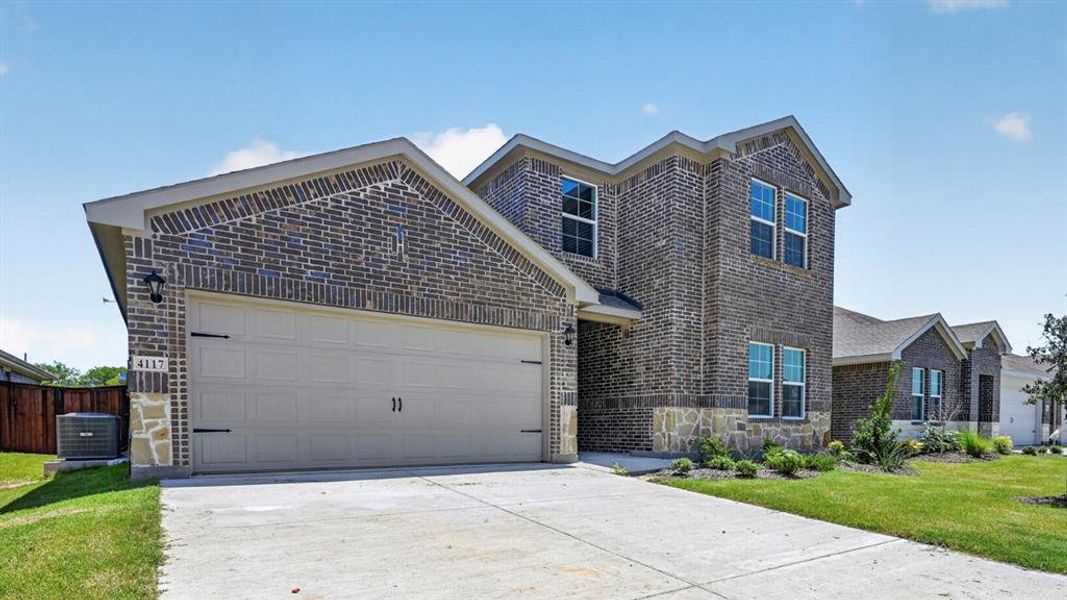 Front exterior of a new home in Sanger Circle, Sanger, TX, highlighting curb appeal (Image 21).