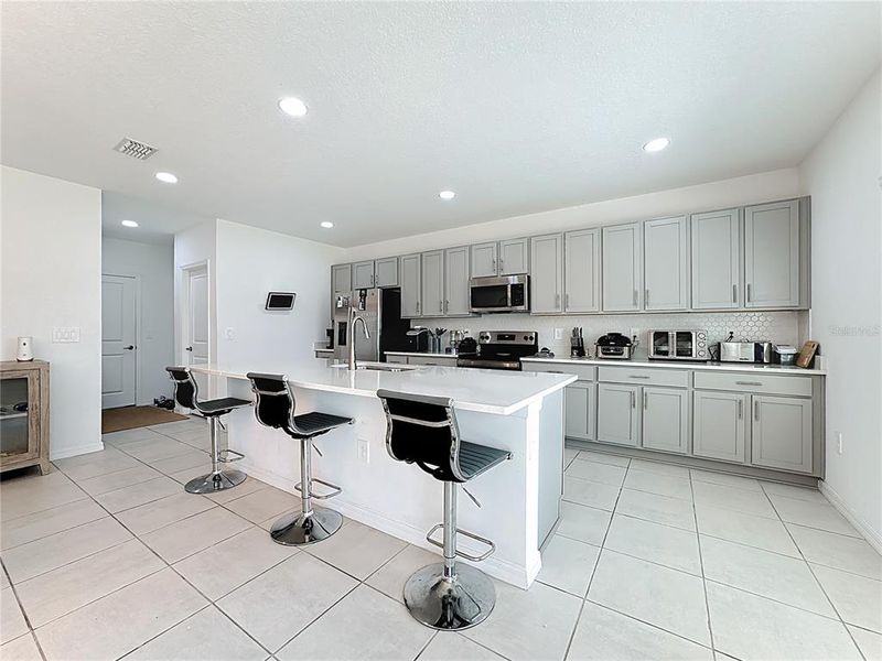Furnished interior view inside a new home in , Kissimmee (Image 4).