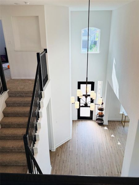 view of high ceiling and staircase