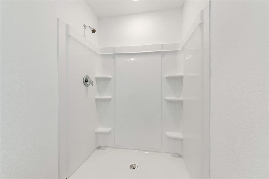 Full bathroom with a stall shower Full bathroom with a stall shower