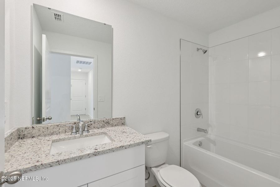 Furnished interior view inside a new home in Flagler Village - Classic Series, Palm Coast (Image 8).