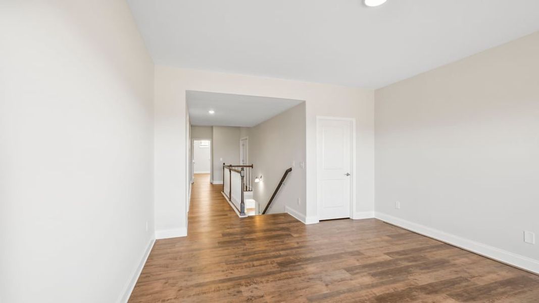 Representative unfurnished interior of a home built from the Crestone by D.R. Horton in Blue Ridge Trail, Fountain Inn (Image 24).