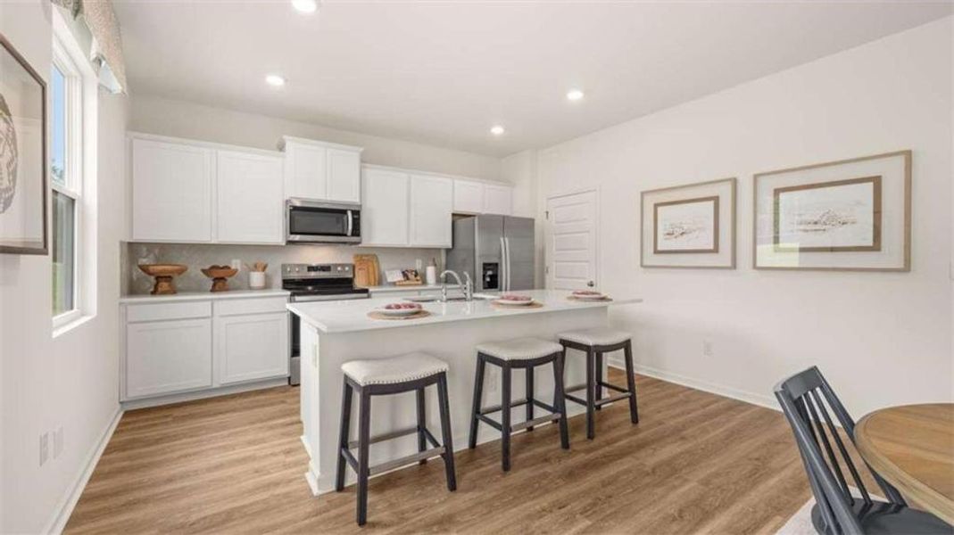 Furnished interior view inside a new home in Oakchase at Hampton, Hampton (Image 25).