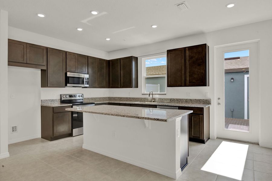 Furnished interior view inside a new home in Eden Crest, Apopka (Image 7).