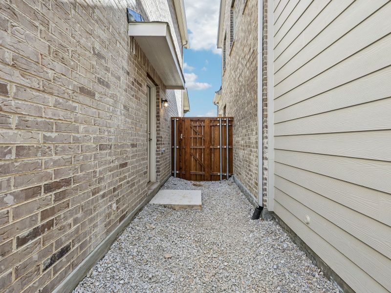 Exterior details and patio area of a home in Oak Ridge Park, Corinth (Image 3).