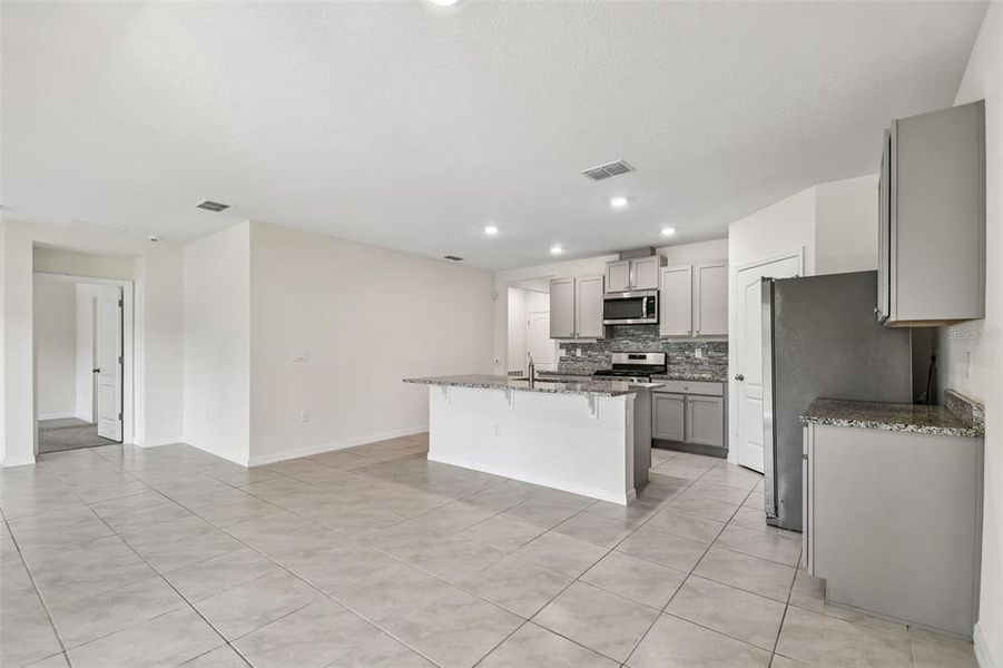 Furnished interior view inside a new home in Riviera Bella, Debary (Image 16).