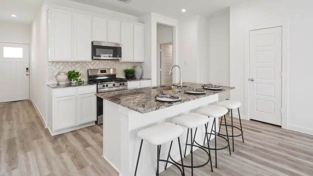 Furnished interior view inside a new home in Legacy Village, Houston (Image 3).