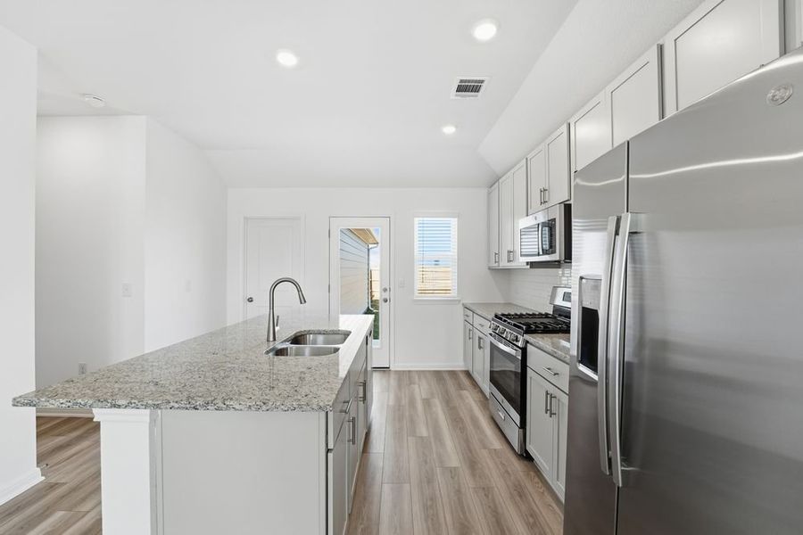 Furnished interior view inside a new home in Longview, Del Valle (Image 8).