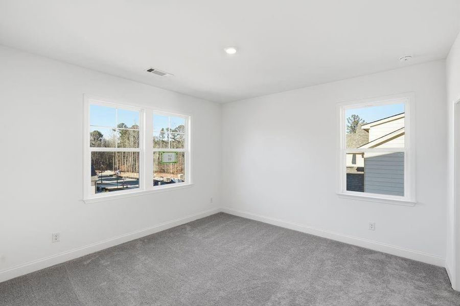 Spacious, unfurnished interior of a new home in Bailey Fence, Dacula (Image 21).