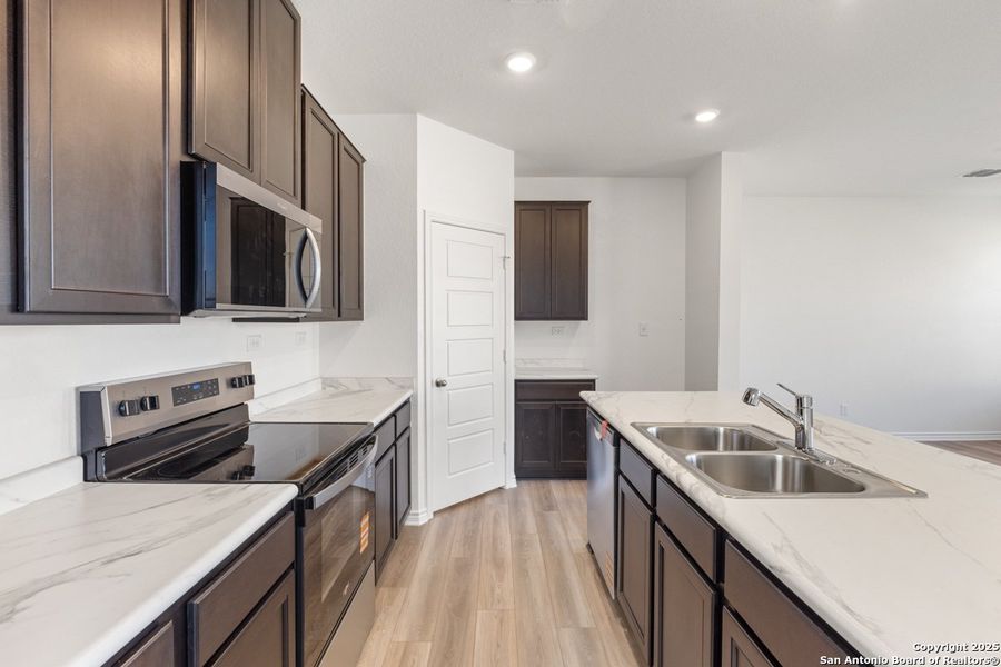 Furnished interior view inside a new home in The Granary - Heritage Collection, San Antonio (Image 6).