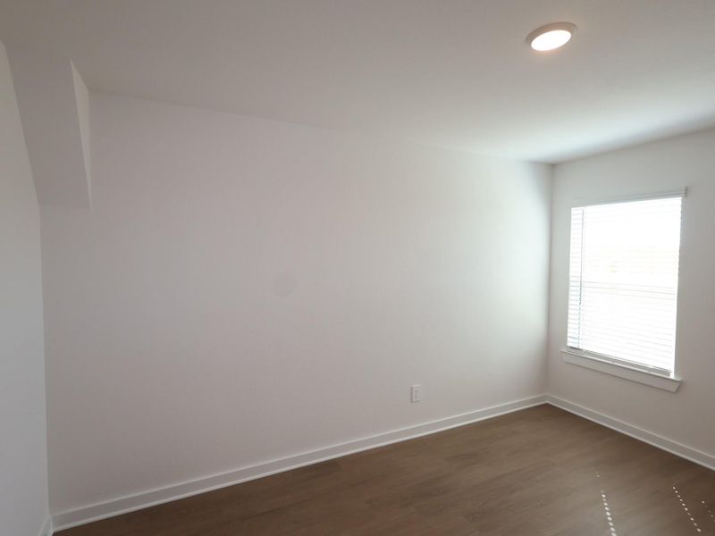 Spacious, unfurnished interior of a new home in Sorella, Tomball (Image 24).