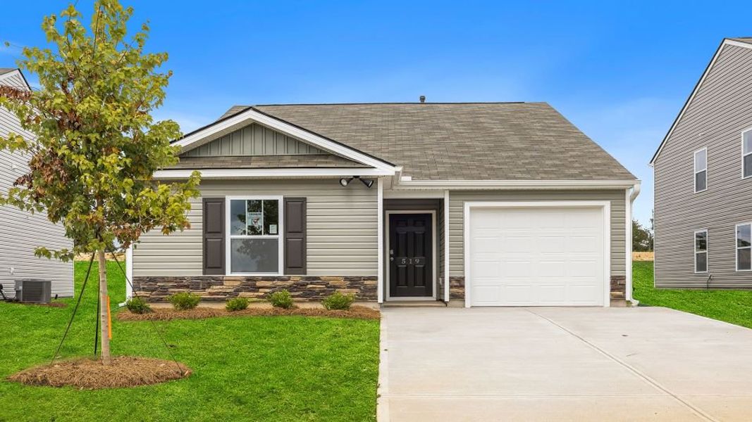 Front exterior of a new home in Durbin Meadows, Fountain Inn, SC, highlighting curb appeal (Image 1).