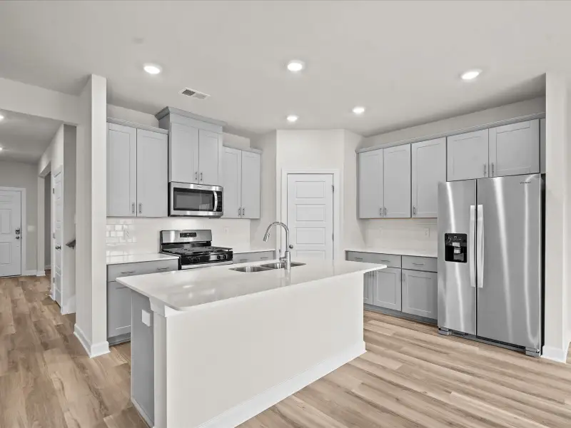 Furnished interior view inside a new home in Chatham Forest, Duncan (Image 5).
