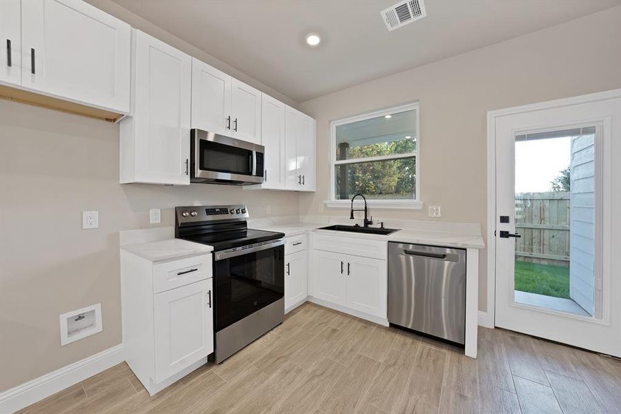 Furnished interior view inside a new home in , Granbury (Image 4).