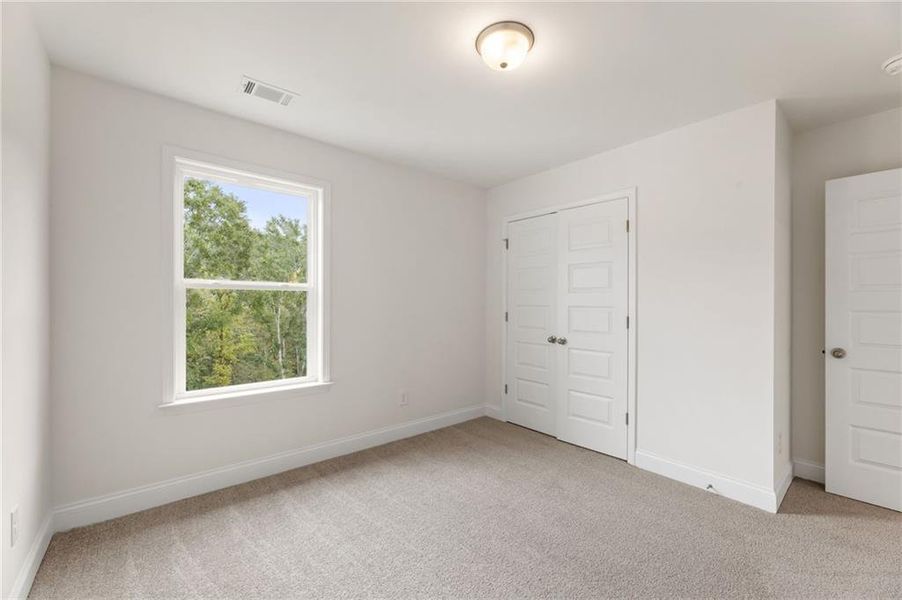 Spacious, unfurnished interior of a new home in Clark Farms, Flowery Branch (Image 29).